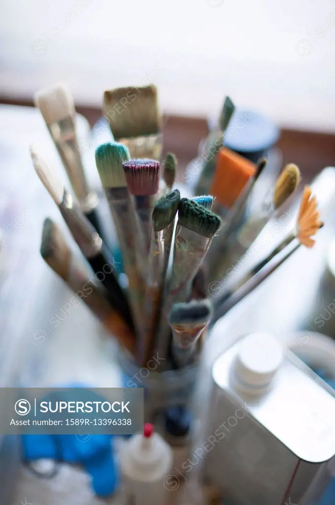 Close up of paintbrushes in jar