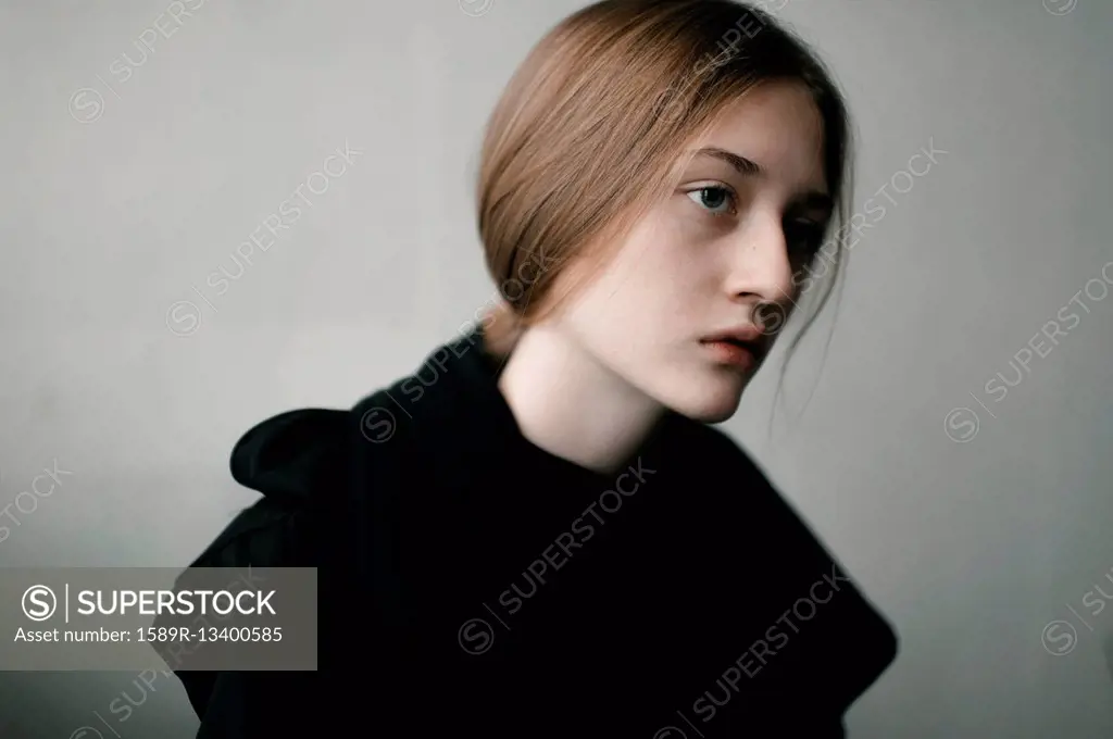 Caucasian woman with serious expression