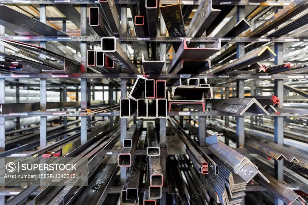 Metal parts on racks in warehouse