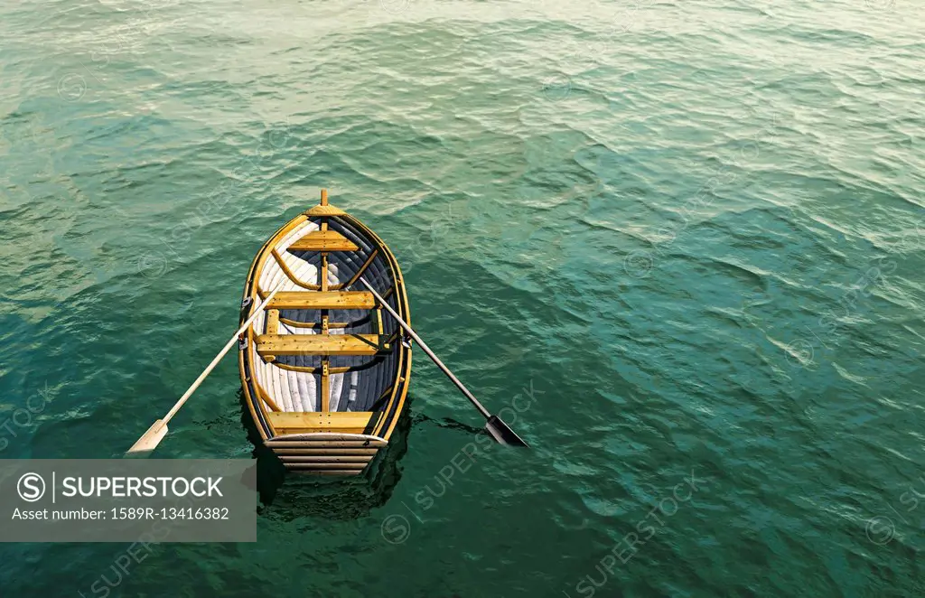 Abandoned rowboat in ocean
