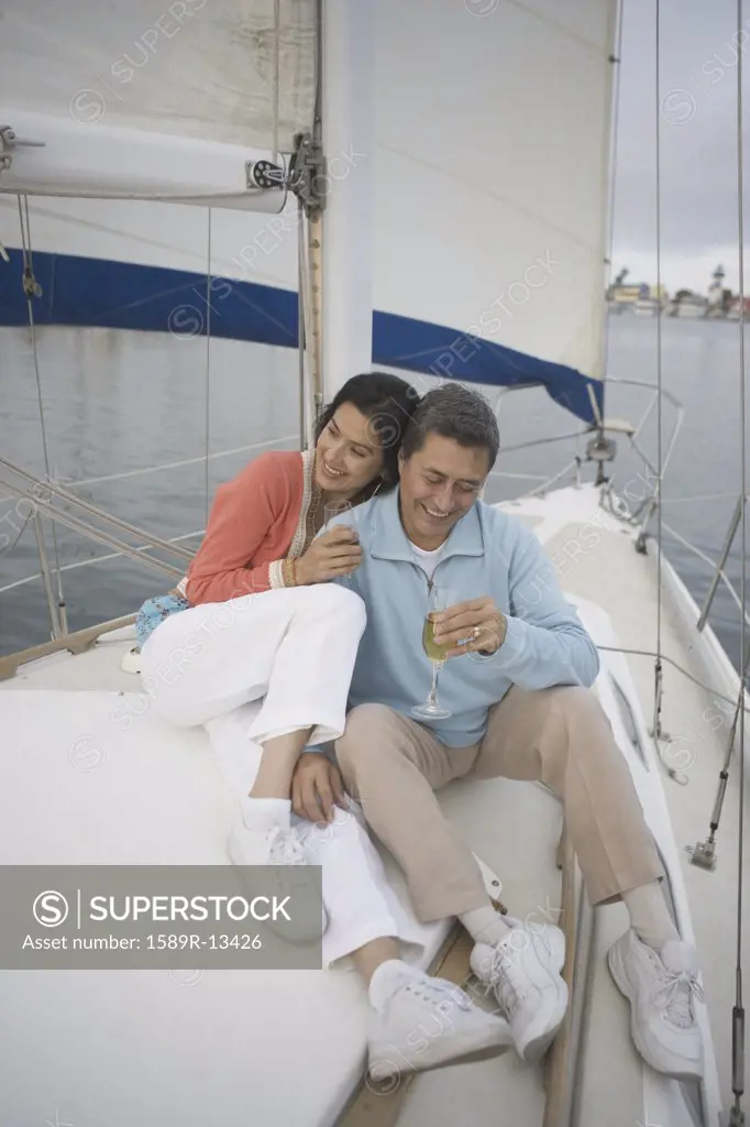 Couple enjoying their sailboat