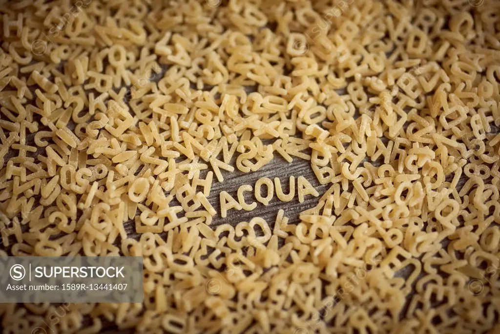 Alphabet noodles spelling acqua
