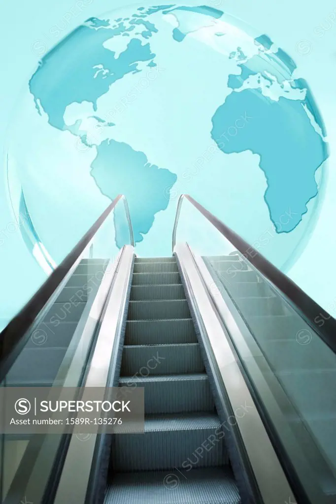 Large, blue glass globe above escalator