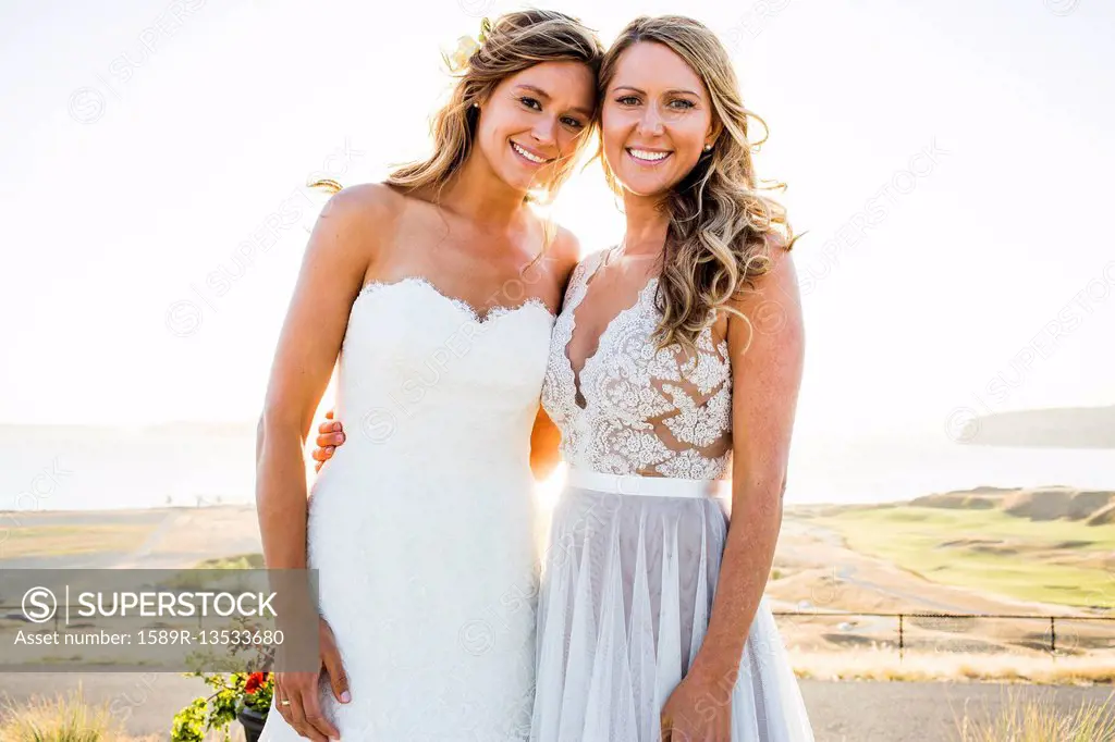 Portrait of smiling Caucasian brides