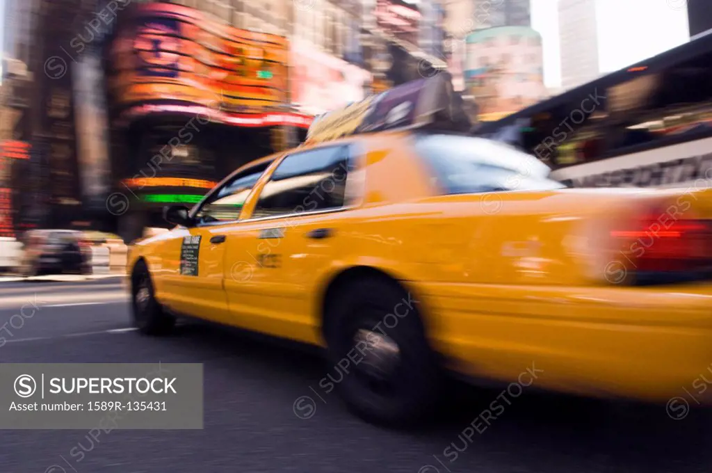 Speeding taxi in city