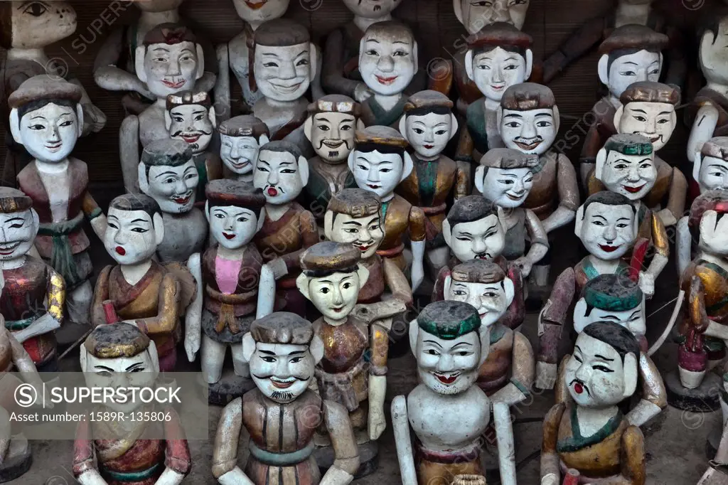Rows of Vietnamese puppet figures