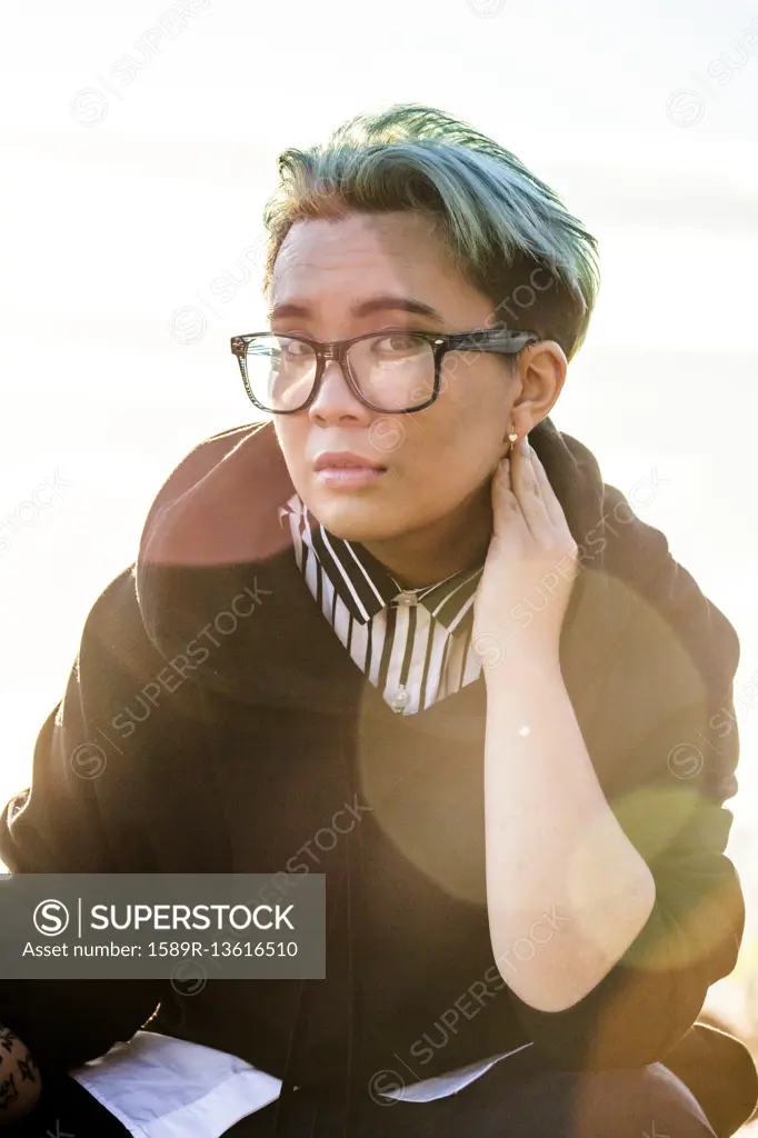 Portrait of serious androgynous Asian woman
