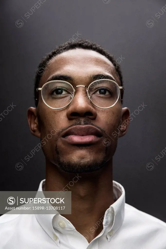 Portrait of serious Black man wearing eyeglasses