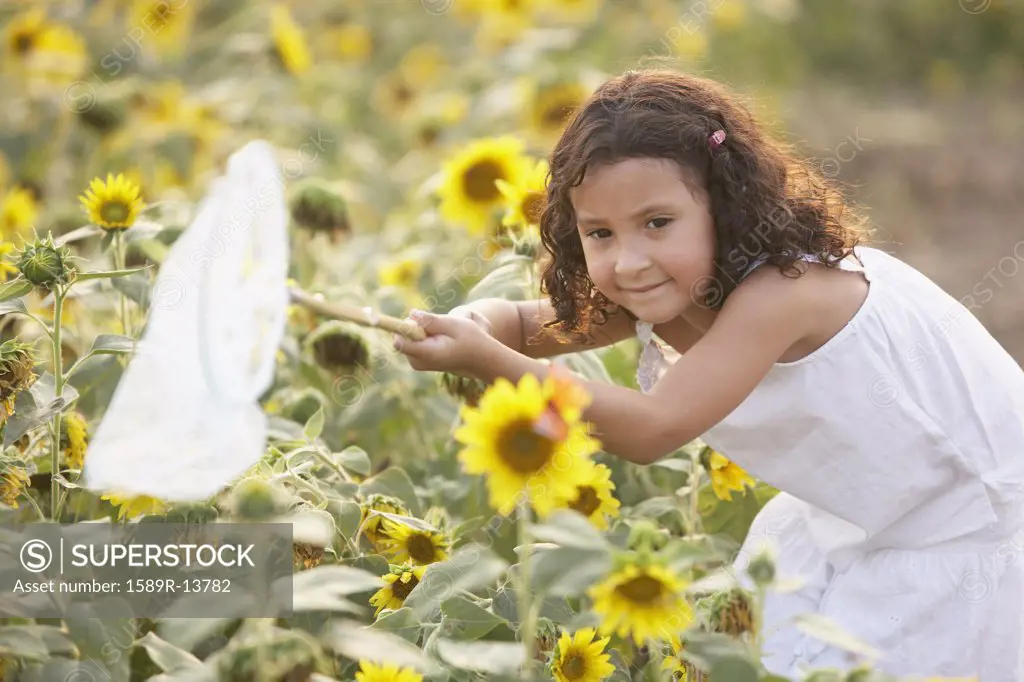 Young girl with butterfly net