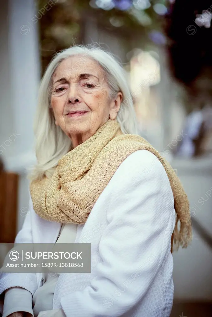 Portrait of serious older Caucasian woman wearing scarf