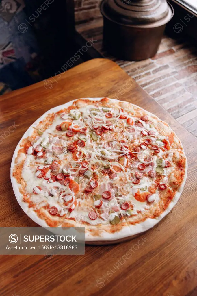 Pizza pie on table