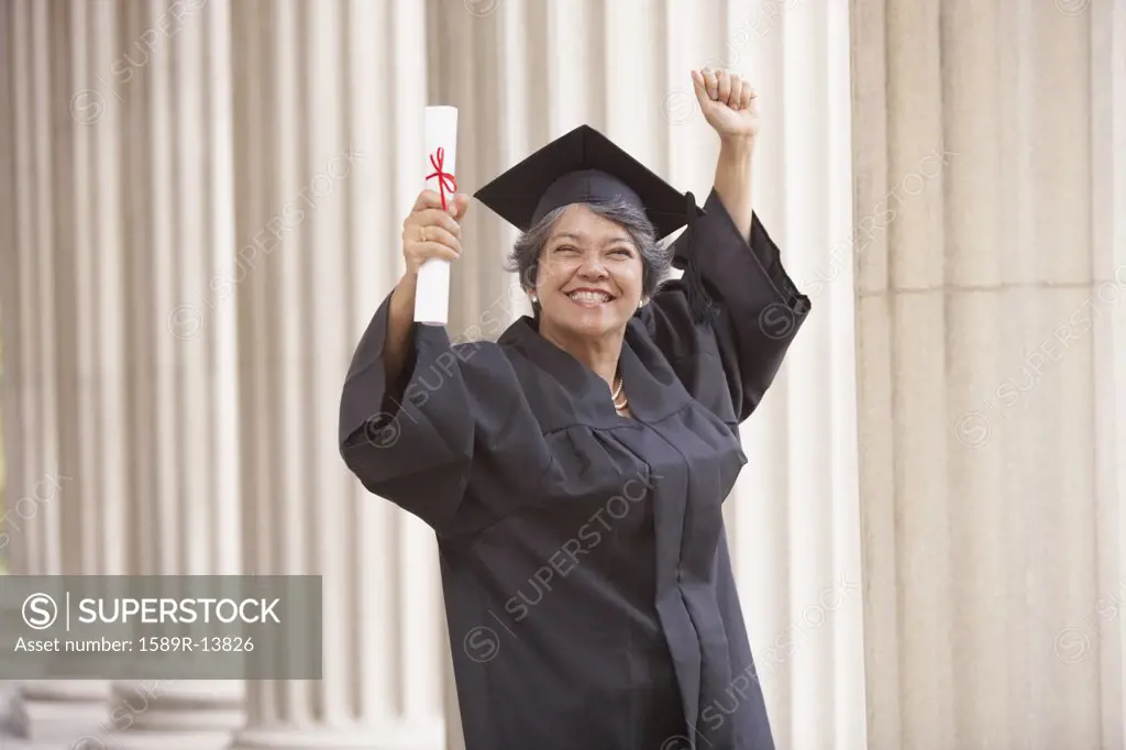 Portrait of mature graduate in cap and gown