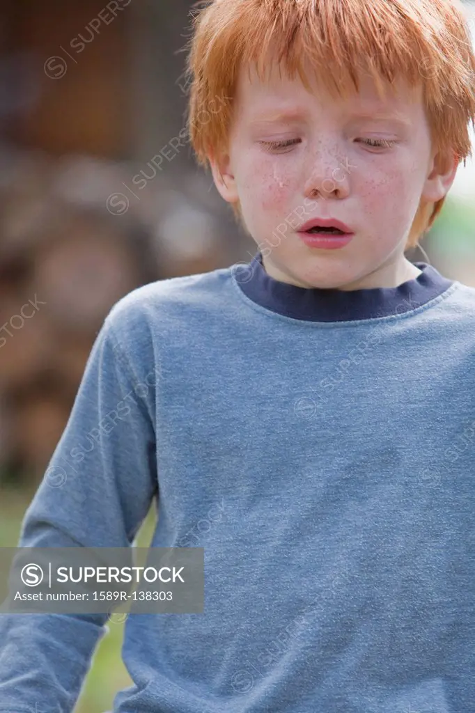 Caucasian boy crying