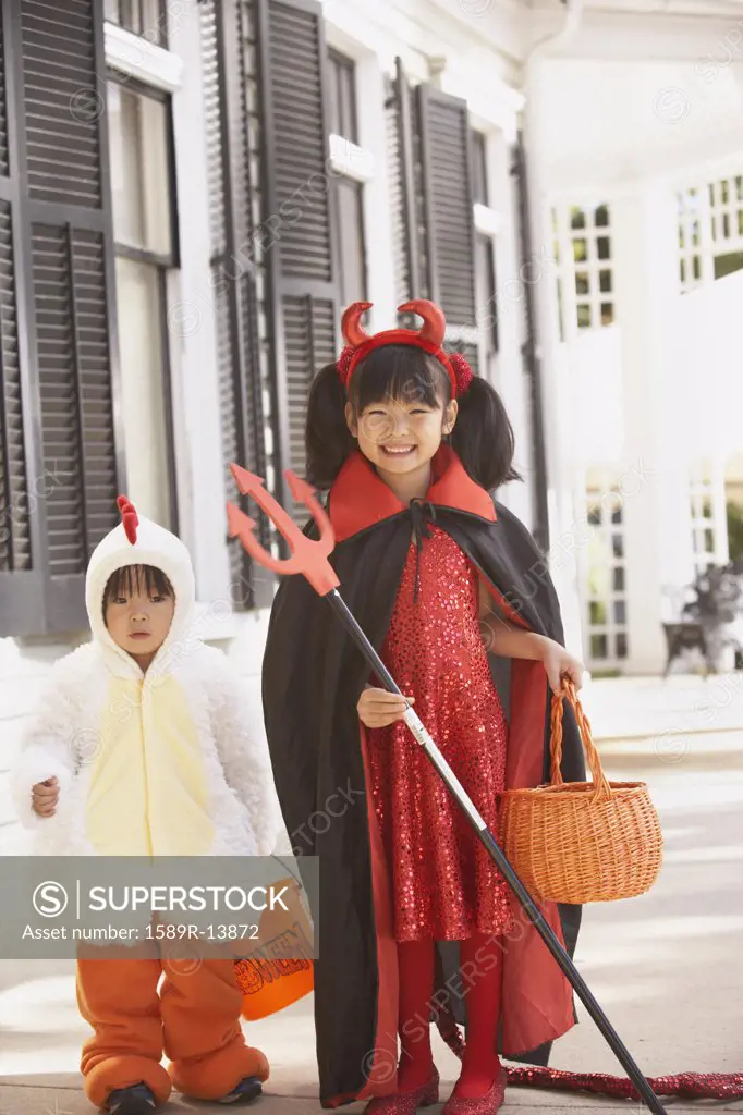 Two girls dressed in costume for halloween