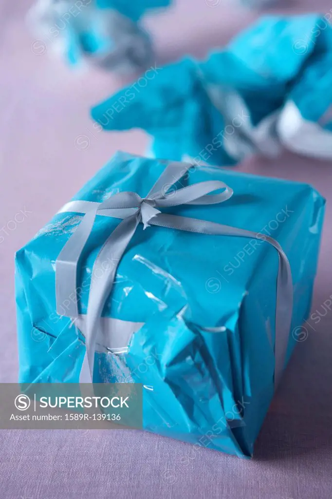 Christmas gift wrapped with wrinkled paper