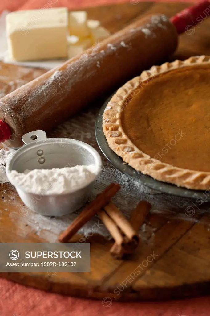 Baking ingredients and homemade pumpkin pie
