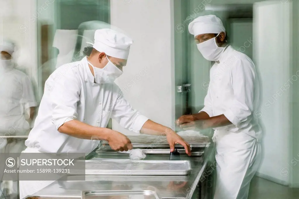 Baker´s working in bakery kitchen