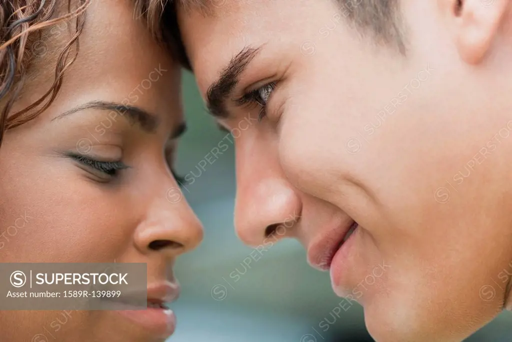 Smiling couple looking at each other