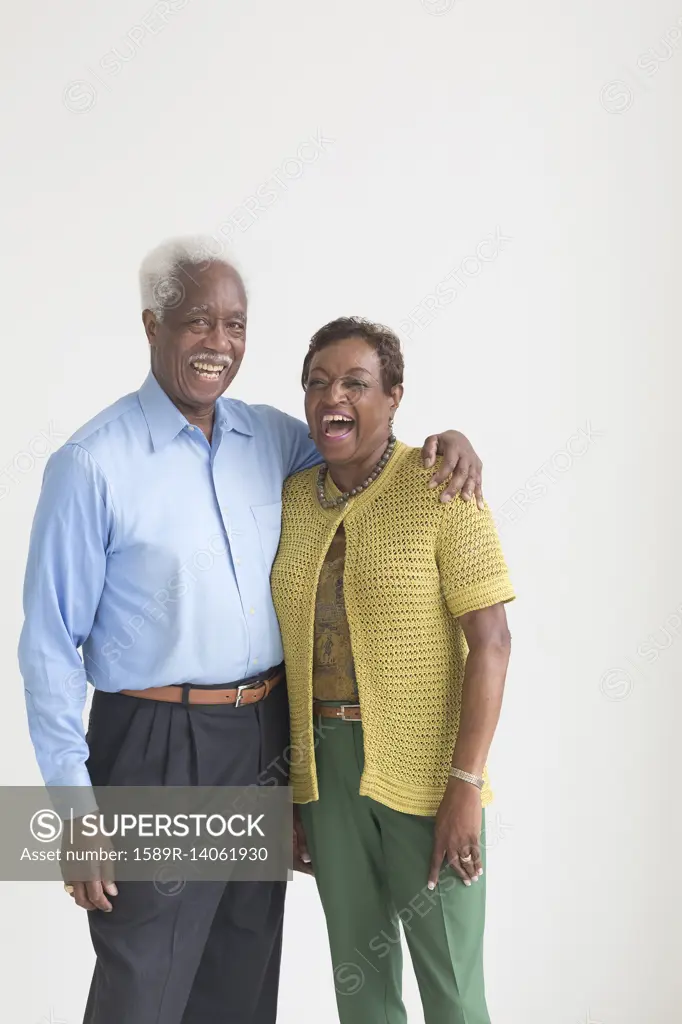 Portrait of laughing older Black couple