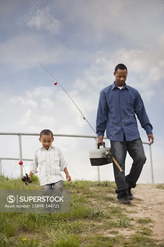 Father and son going fishing together