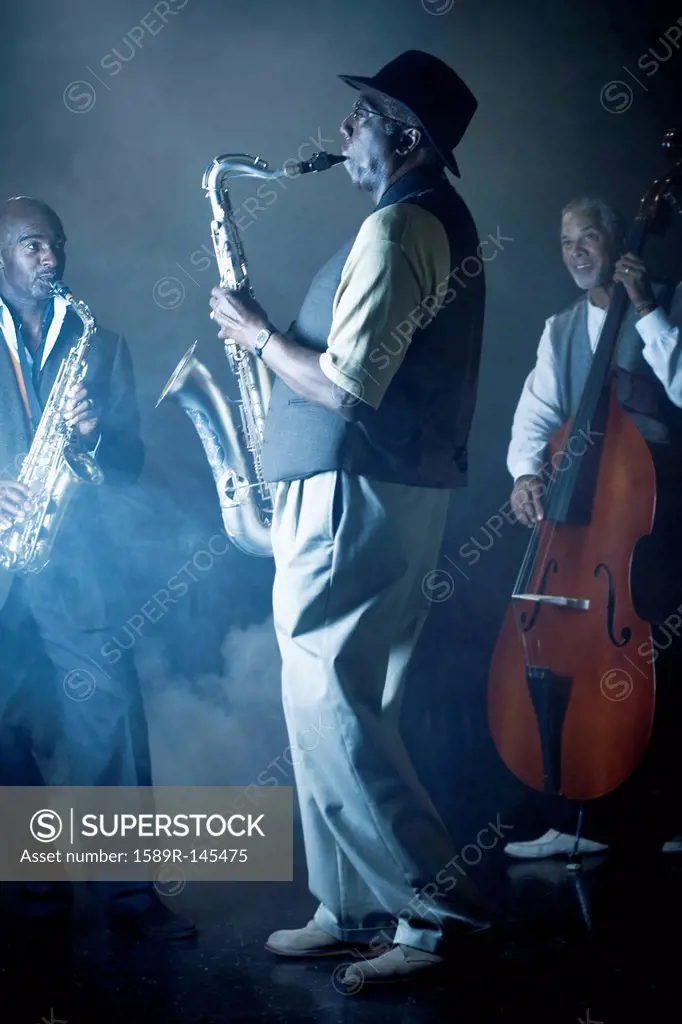 Musicians playing in jazz band on stage