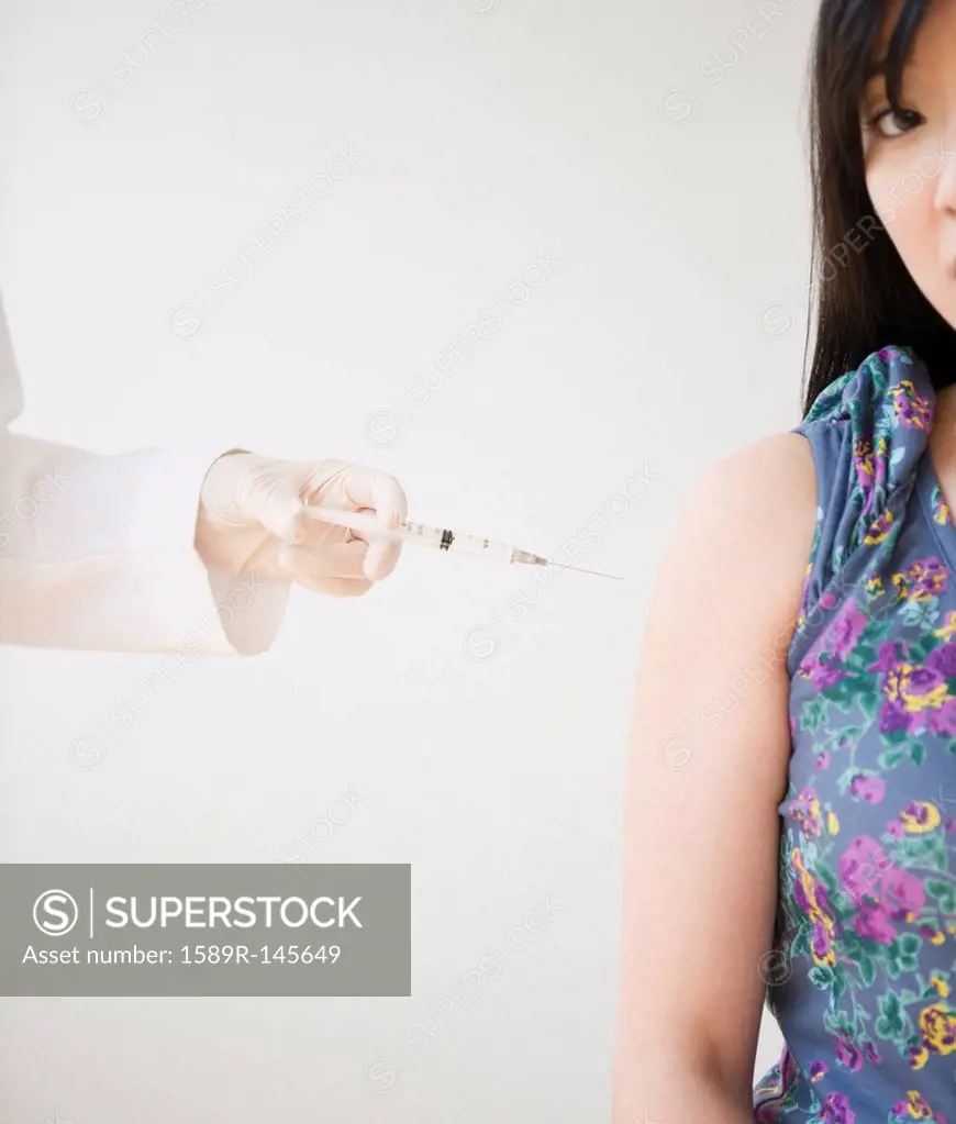 Korean woman receiving injection
