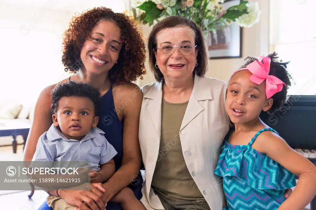 Portrait of smiling mixed race multi-generation family