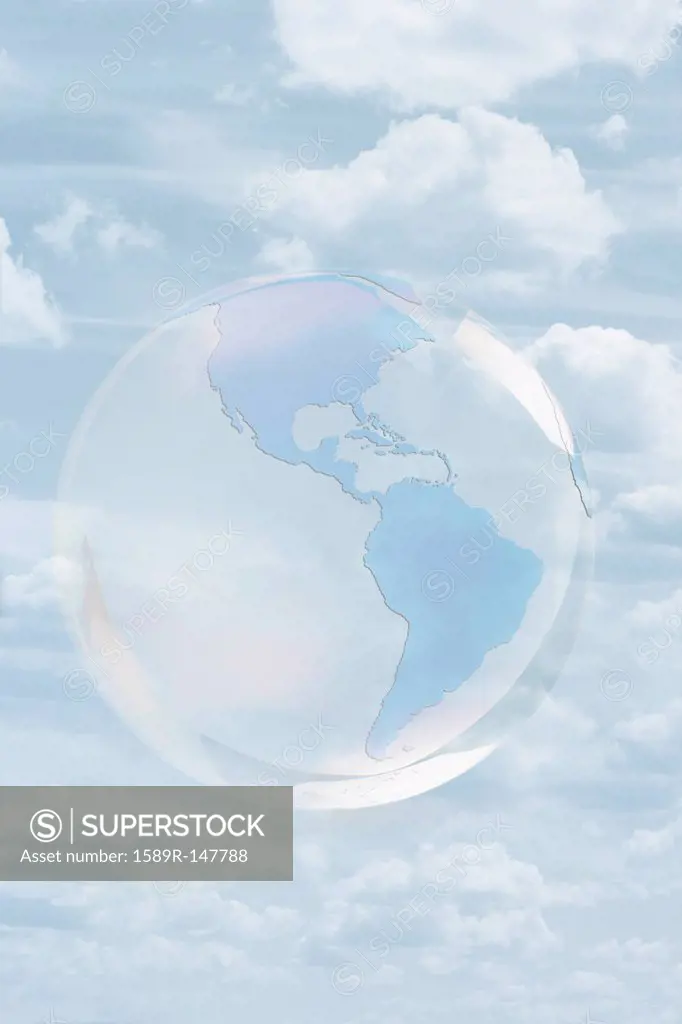 Transparent globe floating in sky