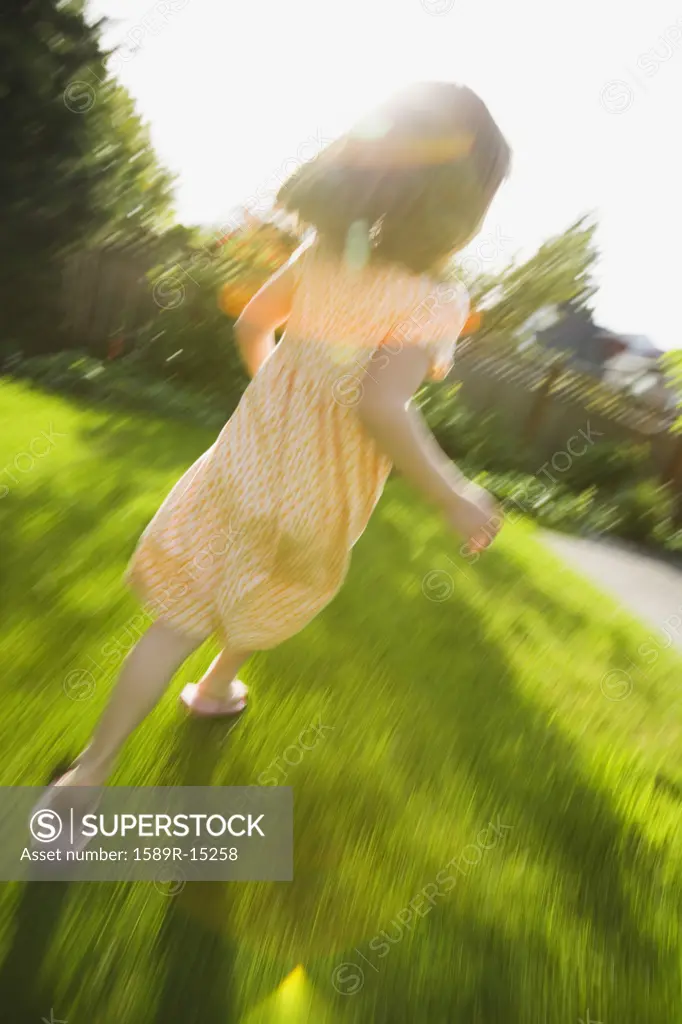 Girl running in blurred motion
