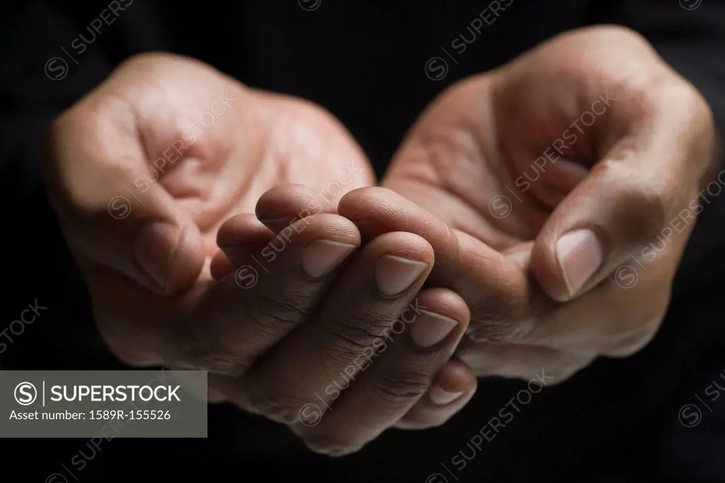 Close up of mixed race man´s hands