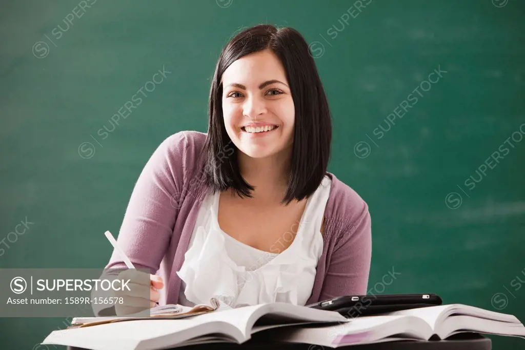 Caucasian student doing homework
