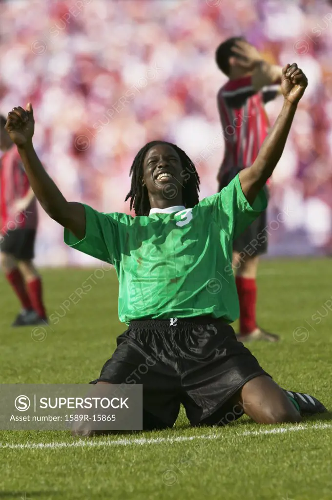 Soccer player celebrating goal