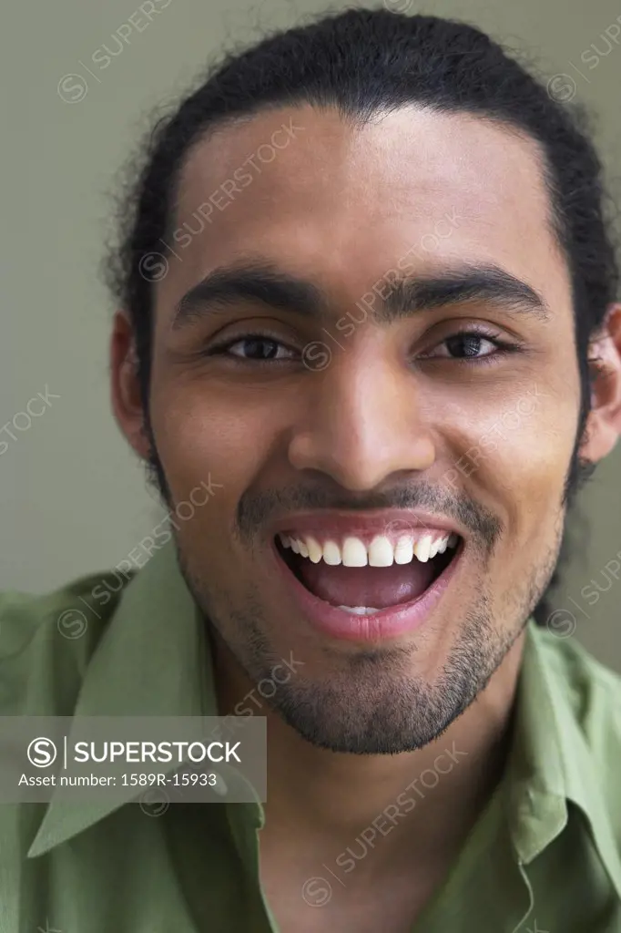 Close up portrait of man laughing