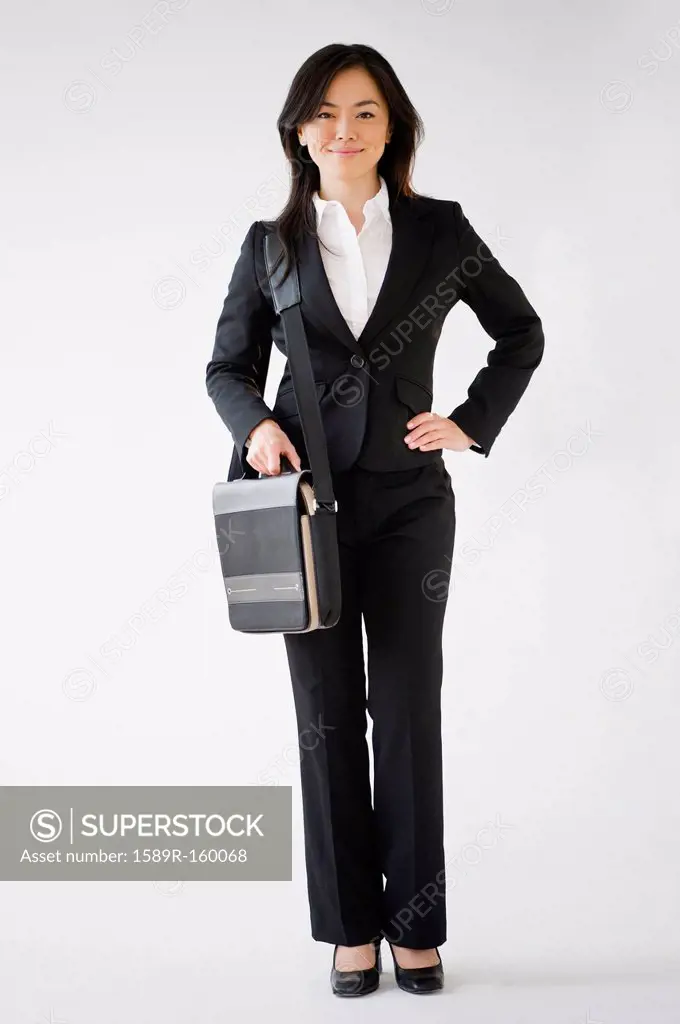 Japanese businesswoman carrying briefcase