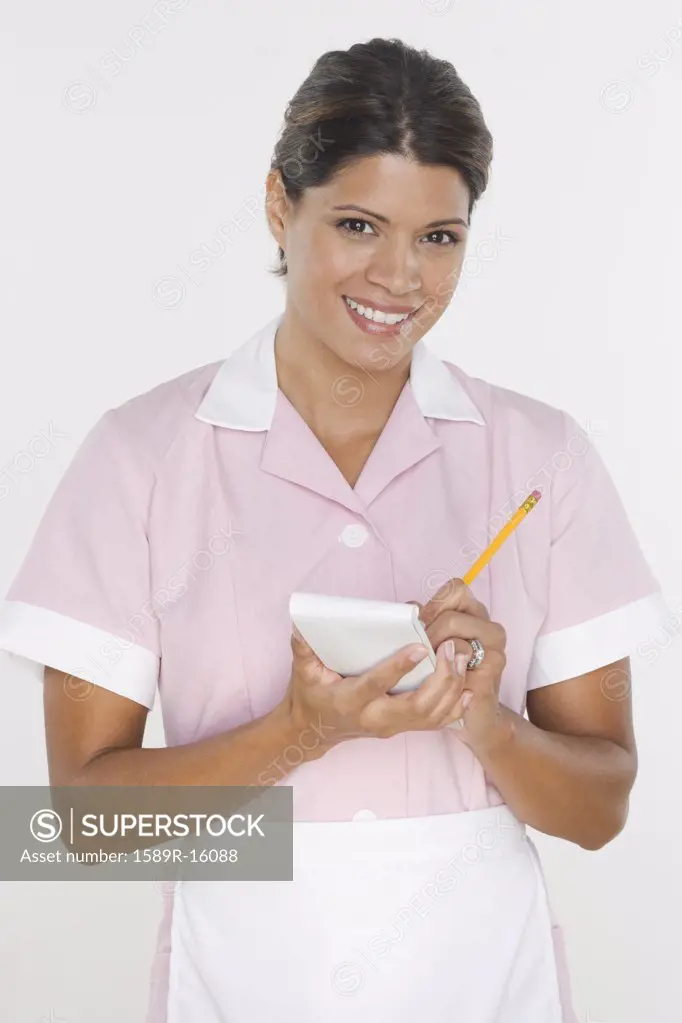 Portrait of waitress taking order