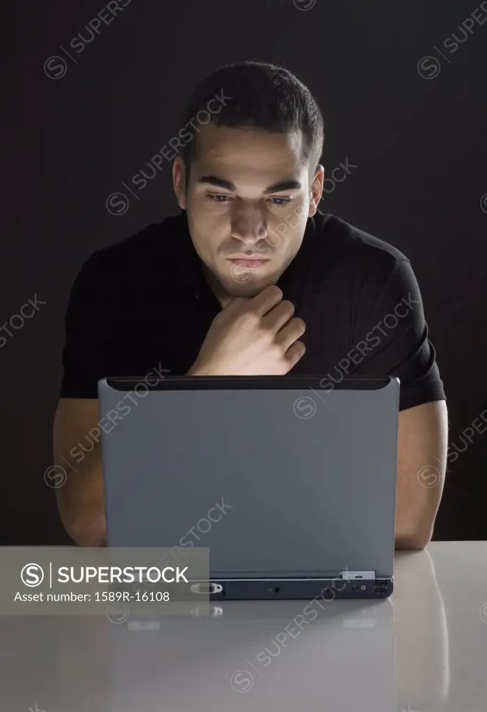 Man in front of laptop