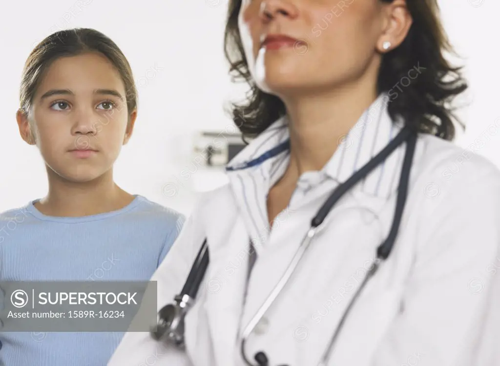 Young girl admiring a female doctor