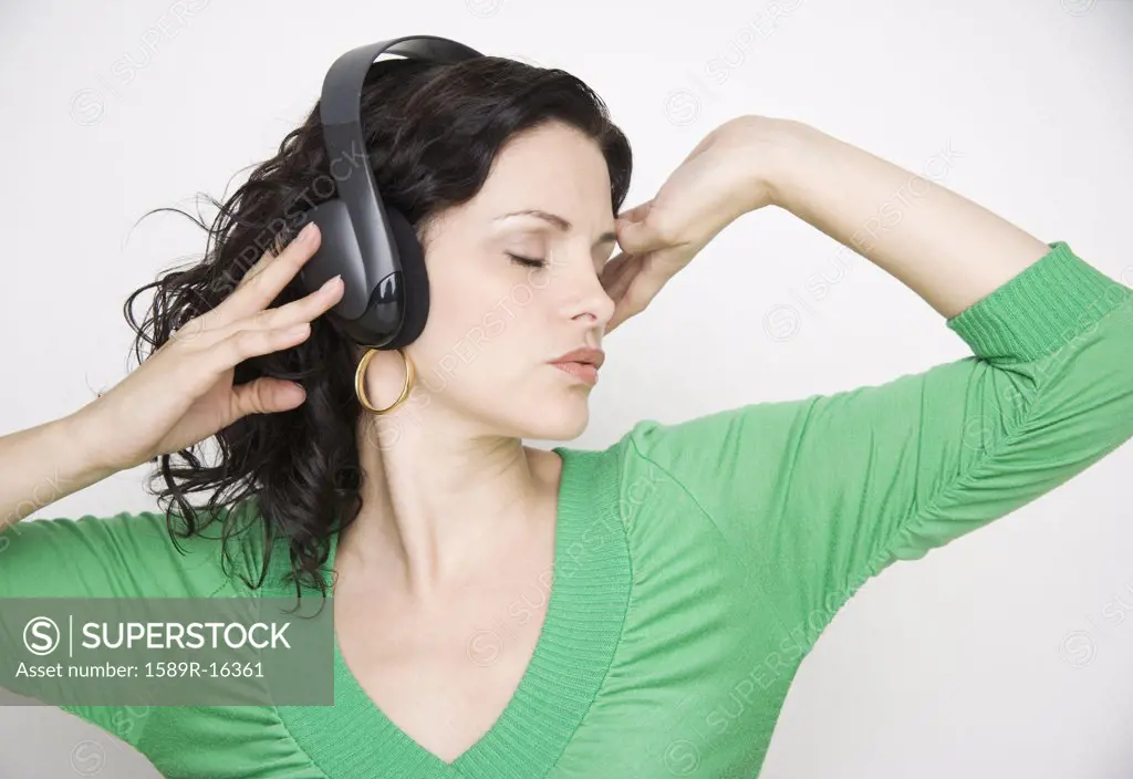 Woman listening to music on headset