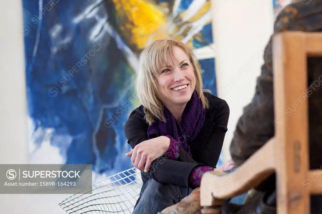 Caucasian woman in art gallery