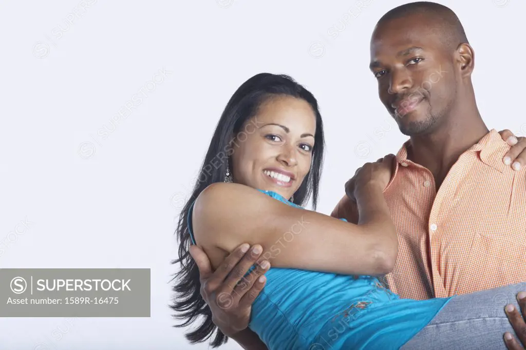 Man carrying his girlfriend