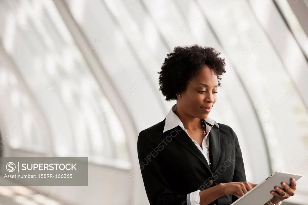African American businesswoman using digital tablet