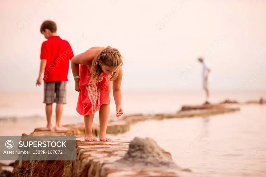 Children playing on jetty