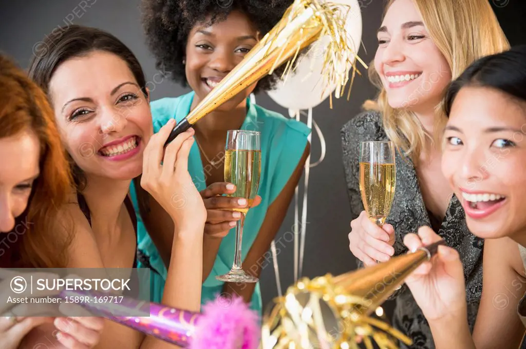 Smiling women celebrating at party