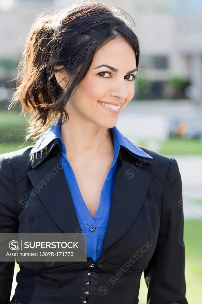 Smiling Hispanic businesswoman