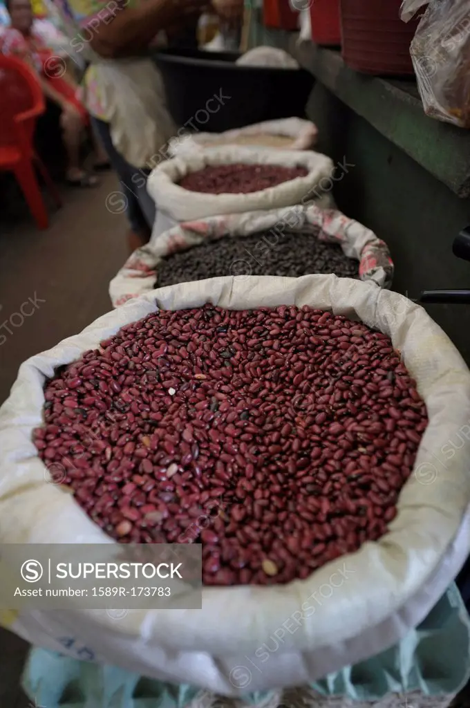 Sacks of dried beans at market