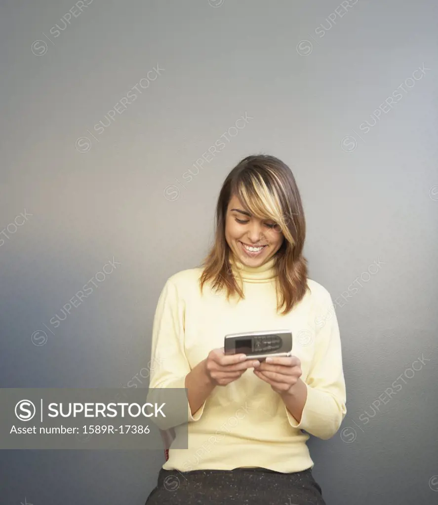 Businesswoman using a cell phone