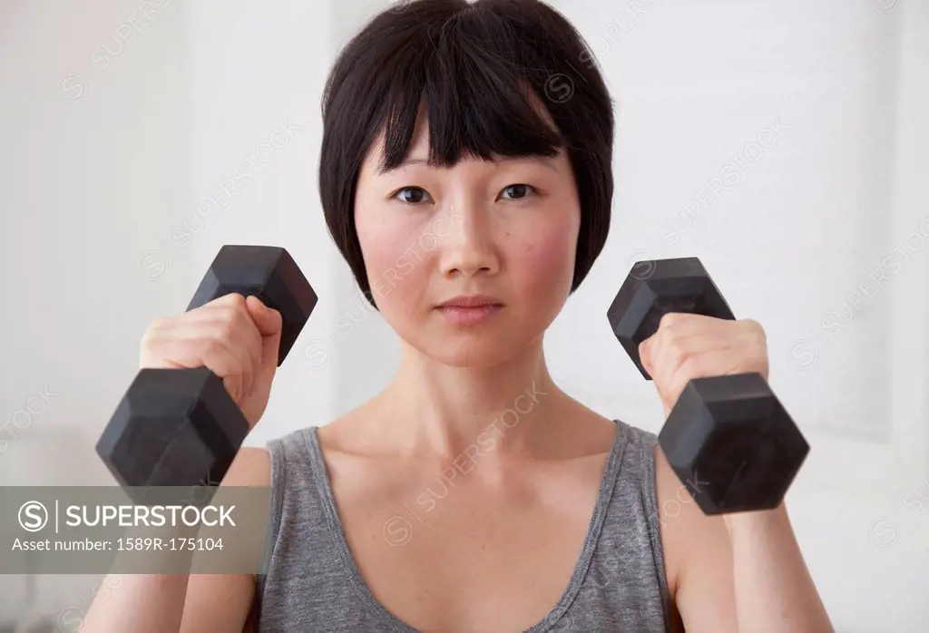 Chinese woman lifting weights