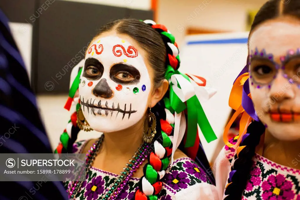 Hispanic children celebrating Dia de los Muertos