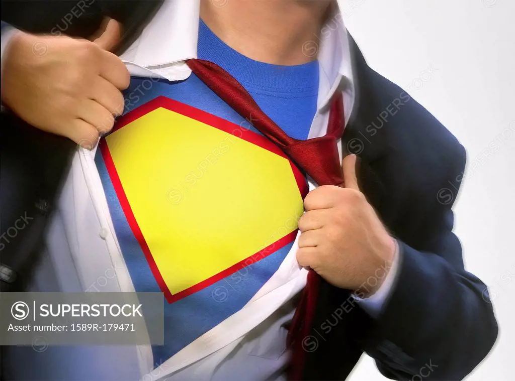 Businessman wearing superhero costume