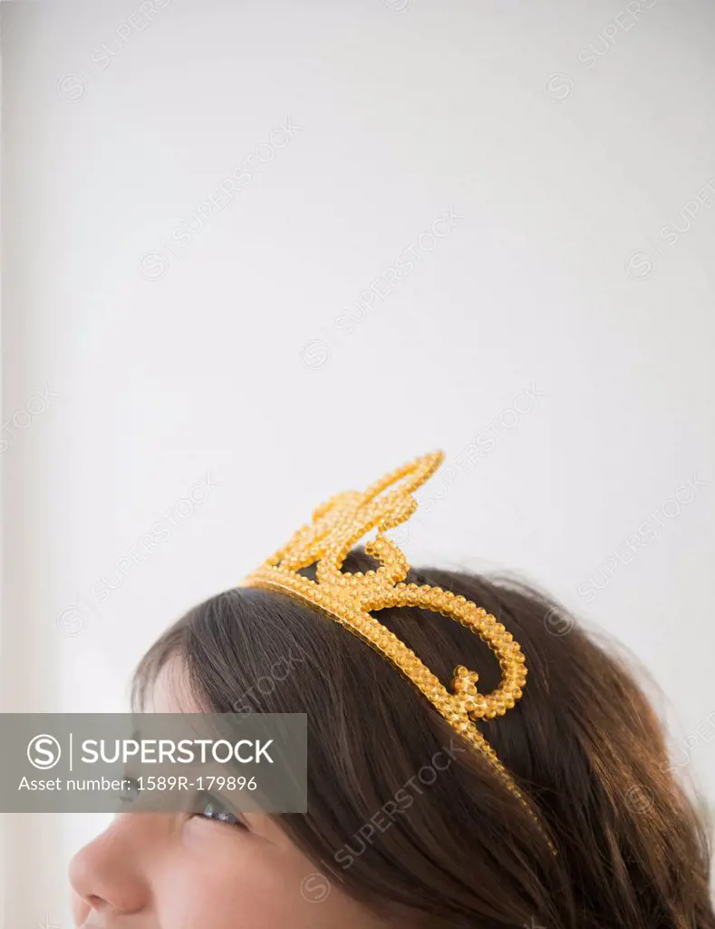 Hispanic girl wearing tiara